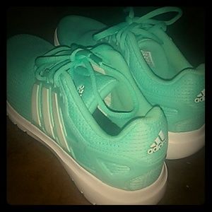 Turquoise Adidas (Small/Medium i'm not sure lol)